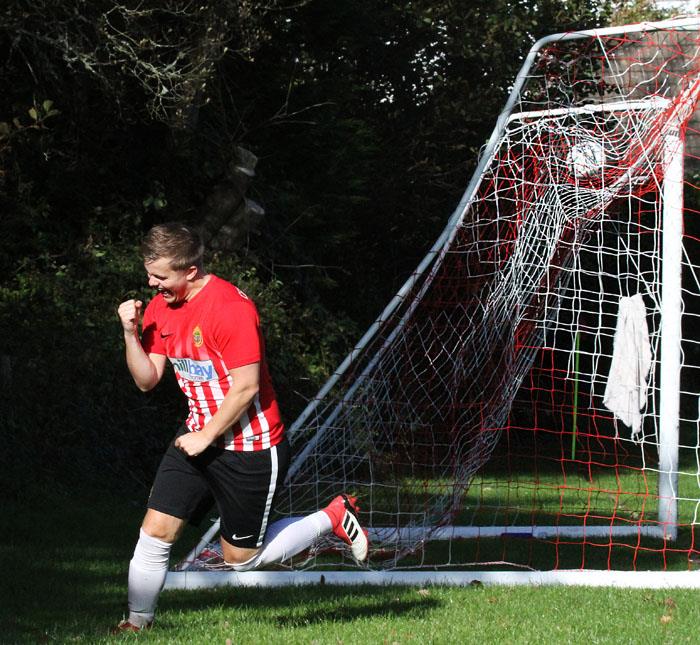 Jack Franklin celebrates scoring for Saundersfoot against Neyland