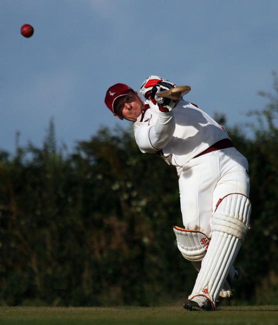 Iwan Izzard hits a six