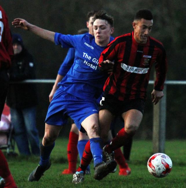 Tenbys Daryl Mansbridge tries to evade Bridges Will Haworth