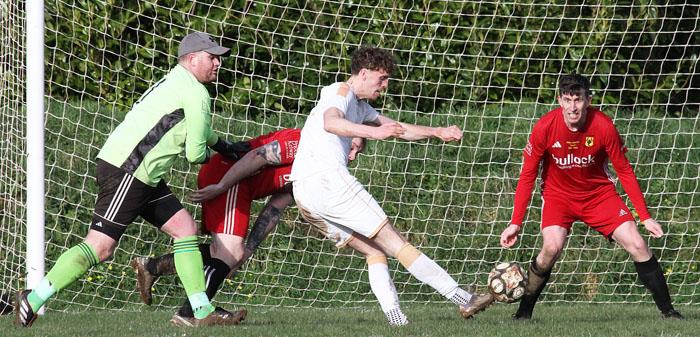 Tom Jago has a shot at goal Tom Jago has a shot at goal