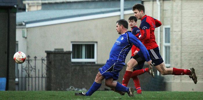 Ritchie Adams passes forward. Picture by Susan McKehon