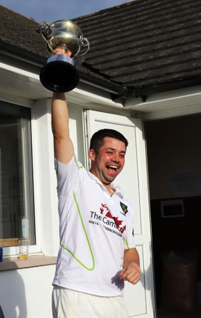 Richard Reed holds the cup aloft