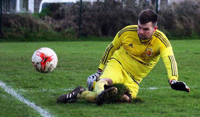 Goalkeeper pulls off a save Picture by Susan McKehon