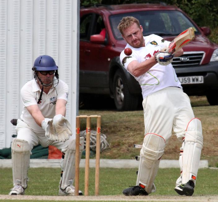 Ben RV Jones smashes a boundary for Llanrhian