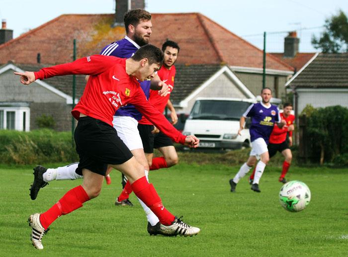 Scott Ferney strikes the opening goal for Carew against West Dragons