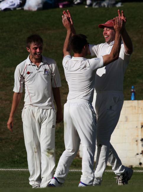 Simon Stanford and James Caine celebrate Simons catch