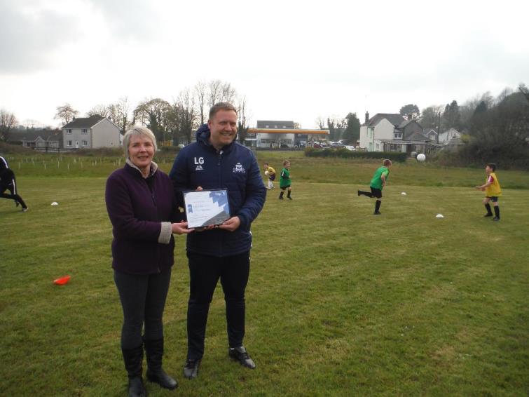 Lucas Gamble from Kilgetty AFC with Angela Miles