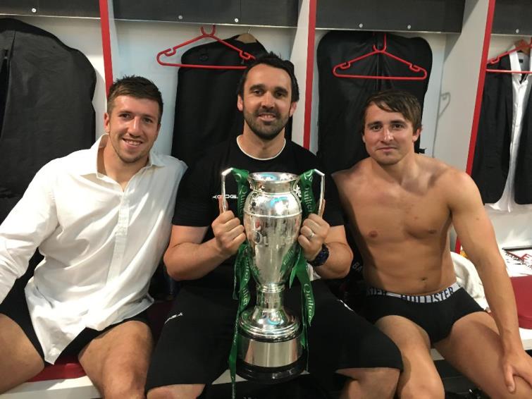 Holding the trophy after helping to coach The Barbarians