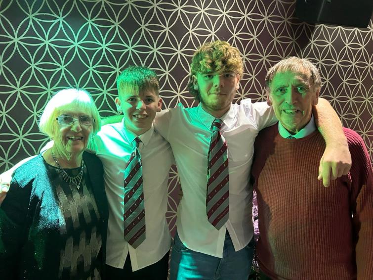 John and wife Monica with grandsons Ollie and Charlie