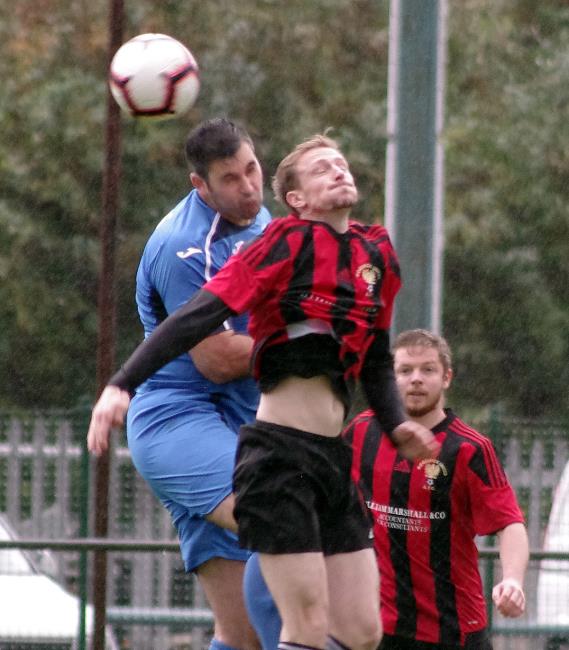 Hakins Jonathan Fawcett beats Goodwicks Rhys Dalling to this header