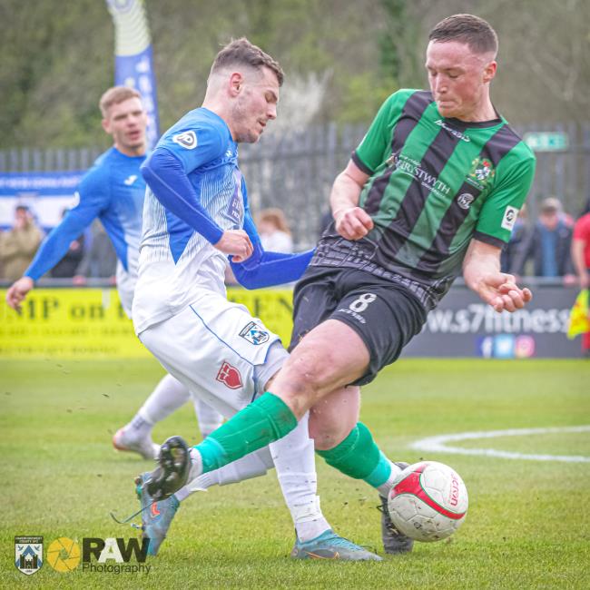 Jordan Davies battles for possession