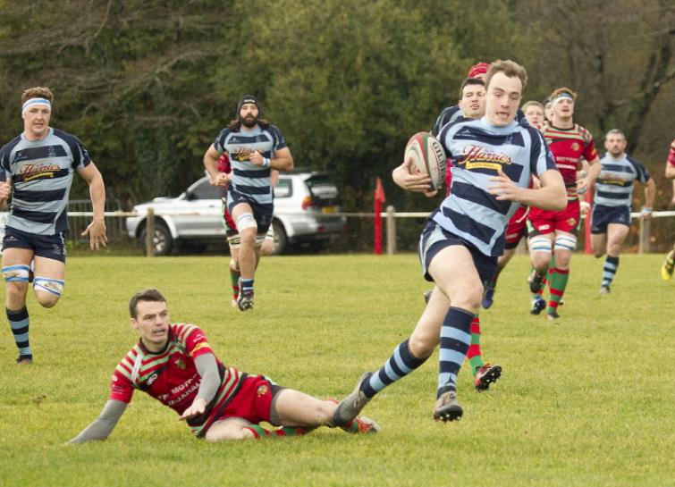 Jack Parkinson goes clear to score a try