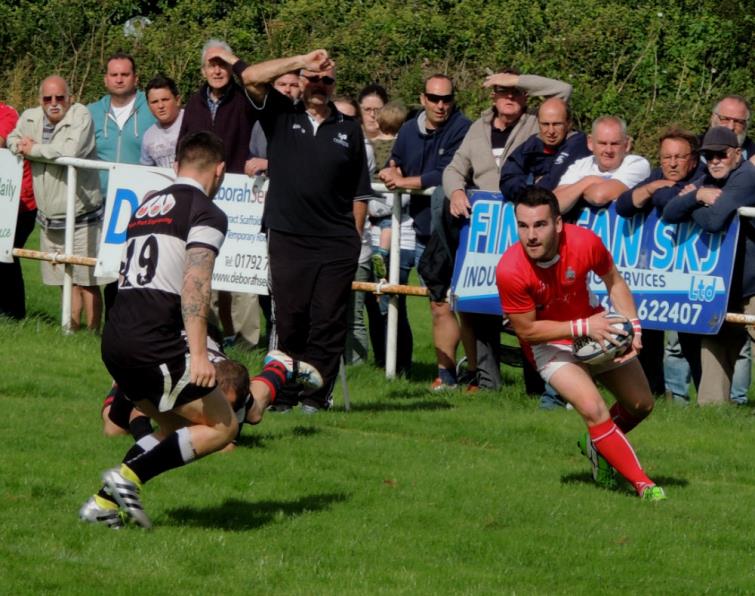 Scarlets winger James Skeels in action