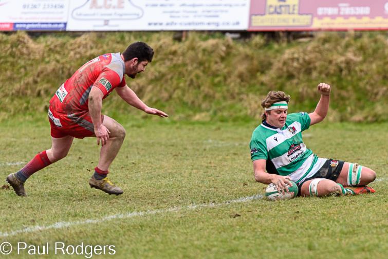 James Thomas scores for Whitland. Picture Paul Rodgers