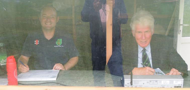 Jason Cole and Phil Tallett through the perspex
