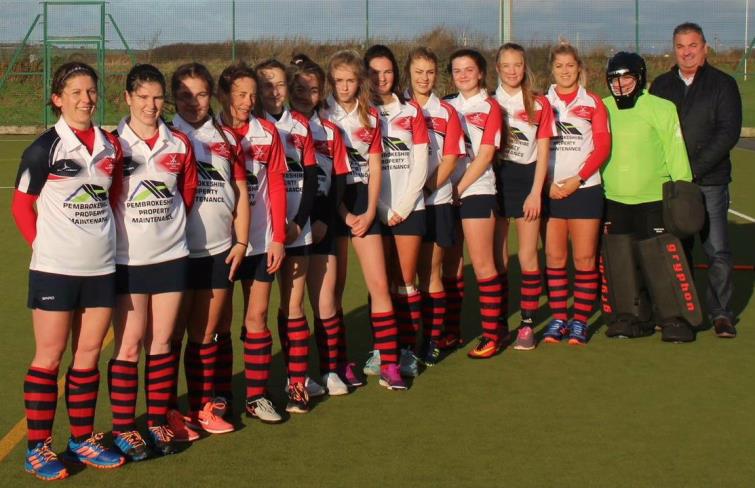 Jemma with her Milford Ladies hockey colleaguesin close-up at hockey