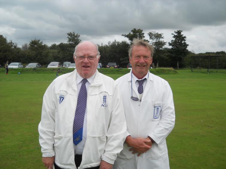 Umpires Arthur Brady and Steve Blowes