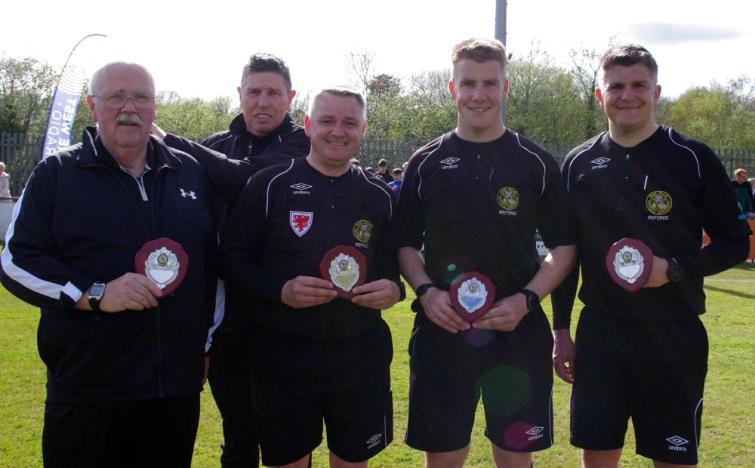 Match officials with medals