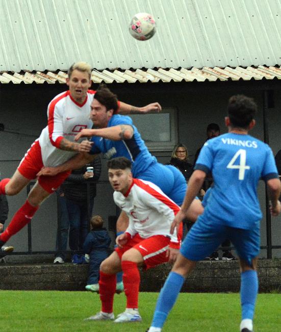 Chris Ormond wins this aerial battle