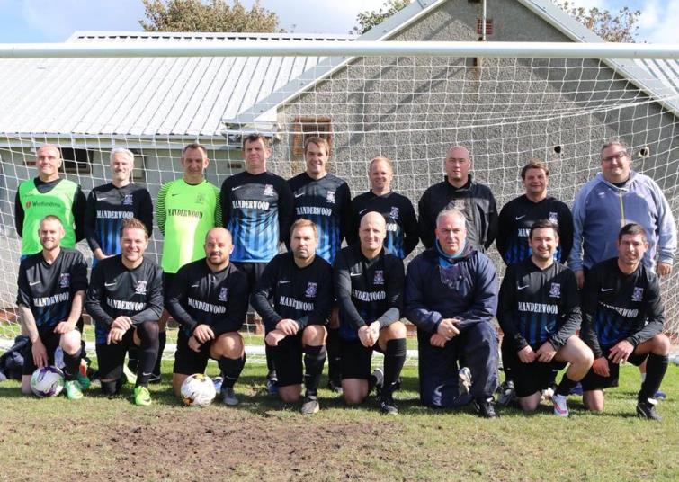 Over 40s back row third left
