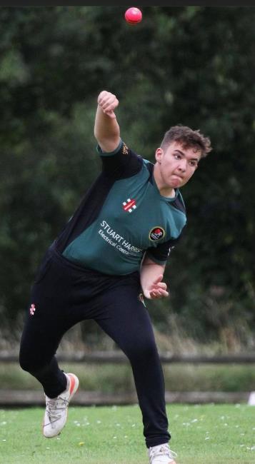 Owen Phelps in bowling action