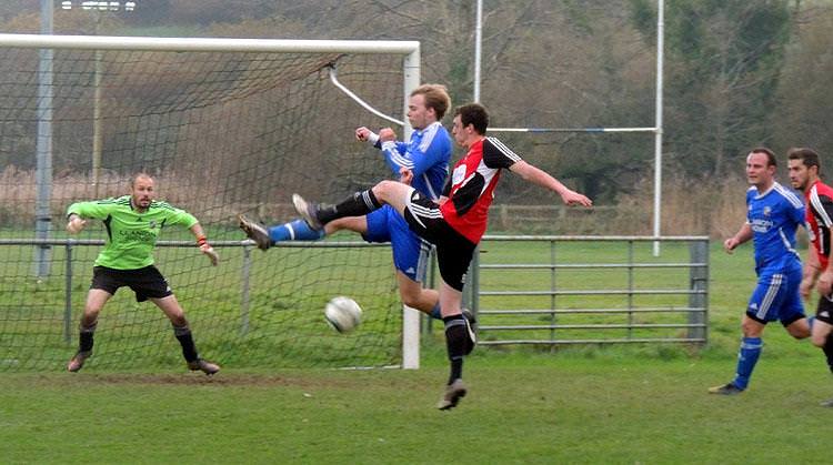  PHOTOS: Monkton Swifts attack at Goodwick United Goodwick’s Aled Rees clears the danger Lewis Banks’ shot is blocked inside Swifts’ area.   All square at Phoenix Park and First Division round-up  Goodwick United 1 Monkton Swifts 1    Goodwick United and Monkton Swifts were involved in a hard-fought tussle at Phoenix Park where neither side was able to capture the initiative enough to take the three points.   But both mangers will look back on chances missed that might have taken them to victory after Dan Scourfield had put the Swifts ahead with a penalty and Kieran O’Brien levelled matters from close range.    Scourfield looked sharp alongside Wayne Brunton and Ben Adams, who created an early chance for Marcus Blair but his header went wide. Wayne O’Sullivan and Anthony Couzens generally stayed in command at the back for Goodwick and at the other end it was Swifts’ skipper Jamie Callan who controlled things, despite strong surges by Sean Dalling and Jac Pepper.   The Swifts went ahead after Paul Lowe played a ball into the box and Adams was pushed – and when Paul Rooney pointed to the spot, up stepped Scourfield to send James Gwilt the wrong way to put his side 1-0 in front.   Goodwick levelled matters from a set-piece as Rhys Dalling drove a low free kick into the area and when it rapped the far post, Kieran O’Brien was on hand to net the simple rebound past Lance Creese.   The second period was equally as keenly contested but neither team was able to break the deadlock. O’Brien went the closest as he struck the crossbar from 20 yards with 15 minutes left – and James Dean had a half chance as he came on as sub for Goodwick in the closing stages.   But in the final analysis perhaps a draw was the fairest result on the day.   Goodwick United: James Gwilt, Darren Devonald, Wayne O’Sullivan, Anthony Couzens, Kieran O’Brien, Lewis Banks, James Evans, Aled Rees, Steve Blackford, Jac Pepper, Rhys Dalling. Subs: James Bottomley, James Dean.   Monkton Swifts: Lance Creese, Jamie Callan, James Russell, Ben Nicholas, Joe Lewis, Daniel Scourfield, Tom Meiring, Blake James, Paul Lowe, Ben Adams, Wayne Brunton. Sub: Marcus Blair.  Referee: Paul Rooney.  Narberth and Hakin United leading the race for the title  Pembrokeshiresport.co.uk takes a look how the other teams got on in the Manderwood Pembrokeshire Football League First Division.  Narberth stay top of the table after hammering St Ishmaels 5-0 at home against St Ishmaels. Grabbing the goals for the high-flying Bluebirds were Rob Shipton (2), Justin Blewitt, Jordan Williams and Tony Evans penalty. Hakin United are in second spot just a point behind the leaders after gaining a 4-1 victory at Saundersfoot Sports. Jack Franklin gave the homesters the lead but the visitors hit back with goals from Ewan Findlay, James Stanmore and two own goal secured the points.  Neyland drew 1-1 at home against West Dragons. Scott Crawford scored an early header for the visitors, but veteran Paul Hannon equalised also scoring a header.  Merlins Bridge secured a hard-fought 3-2 at Pennar Robins. Phil Thompson and Adam John scored for the homesters, but a Daniel Bryce Brace and an own goal secured the points for the Wizards.  The shock result of the day was St Clears winning 3-2 at home against West Wales Intermediate Cup champions Johnston at home. Sean Seymour Davies, Josh Jones and Nick Squire netted for the delighted Saints and Nicky Woodrow (penalty) and Chris Ormond scored in vain for the Tigers.  Tenby were too strong for Hundleton, winning by a 4-0 score line at the Clicketts. Sam Christopher (2), Callum Proctor and Richard Perry netted for Mike Lewis’ team.