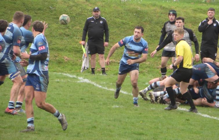 Lewys Gibby gets the ball away