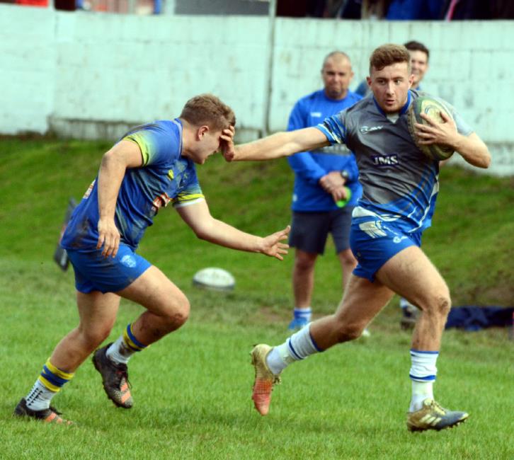 Lee Davies hands off an opponent for Haverfordwest