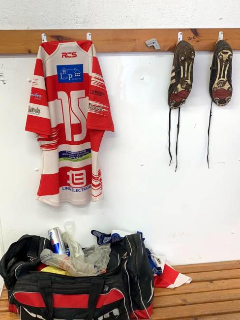 Lee Riley - shirt and boots are hung up