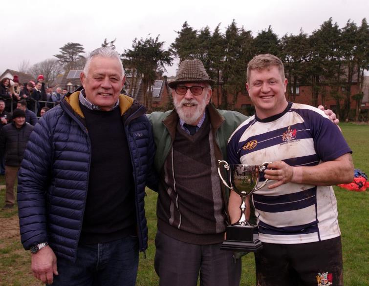 Jack Mason received the inaugural trophy for Pembrokeshire from Lenny Scourfield and the late Dennis Lloyd