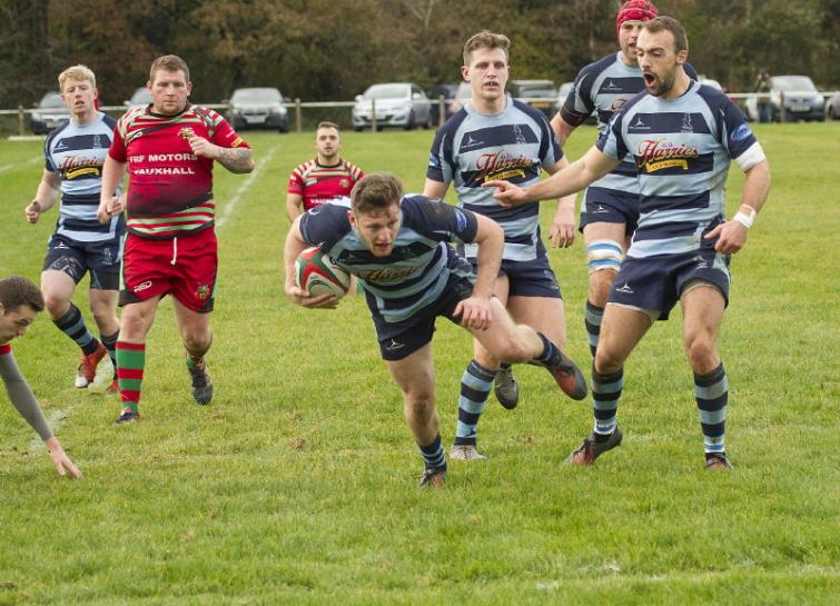 Liam Hutchings scores with brother Joe close by