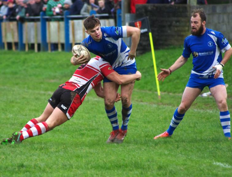 Liam Manwaring is tackled