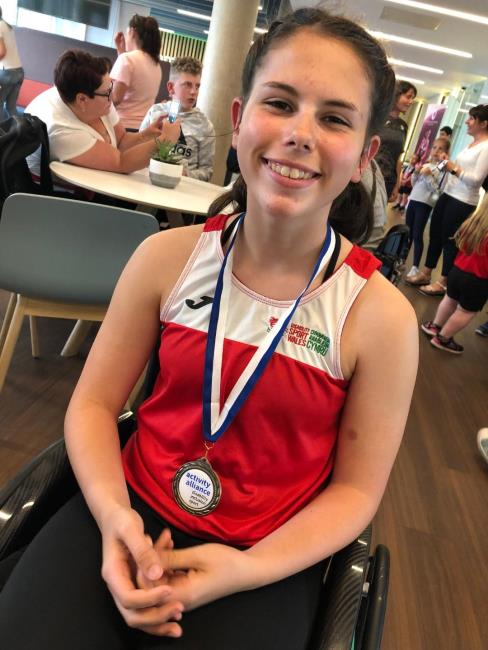 Libi Phillips with gold medal