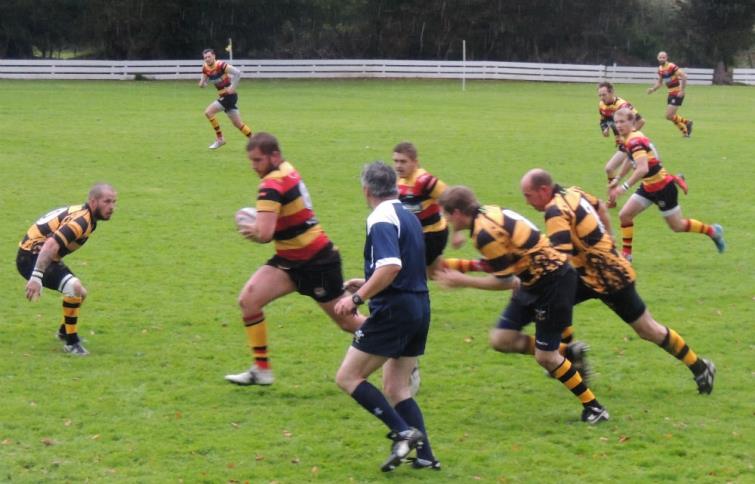 Cardigan skipper Llyr Griffiths on the charge