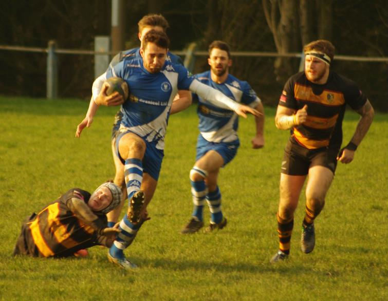 Haverfordwest centre Luke Harvatt breaks through a tackle