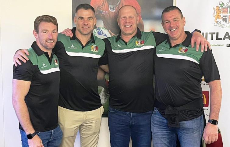 Mike Phillips with Matt Jesse, Gareth Bennett and veteran player Dai Ebsworth after Whitland win