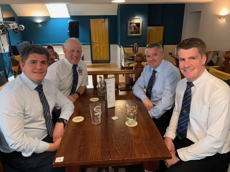 Match officials eating pre-match meal