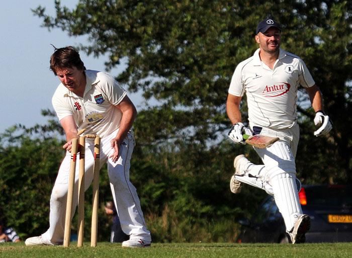 Mathew Davies runs out Huw Scriven as Whitland win the Duggie Morris Cup