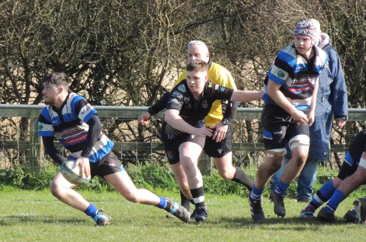 Max Jones gets the ball away for Fishguard
