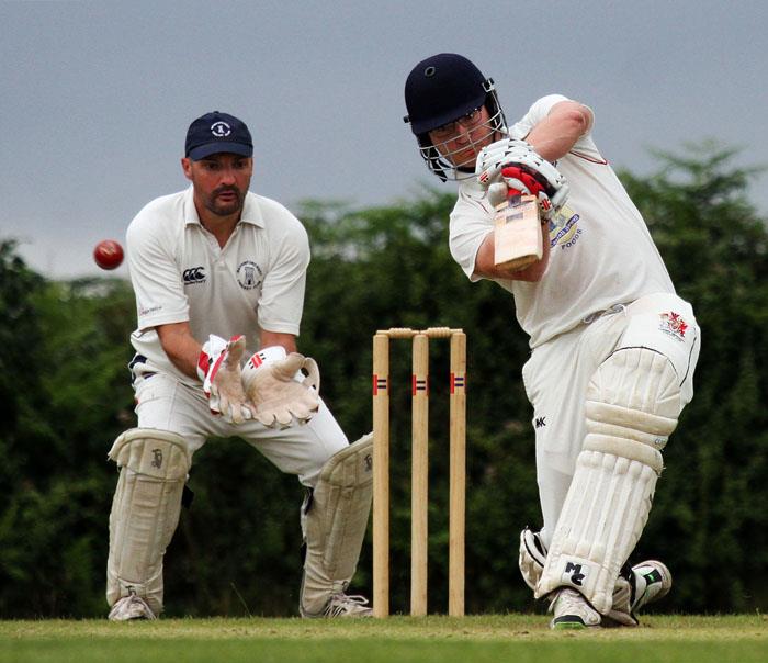 Man of the Match Iestyn Scourfield plays the ball to the cover boundary 