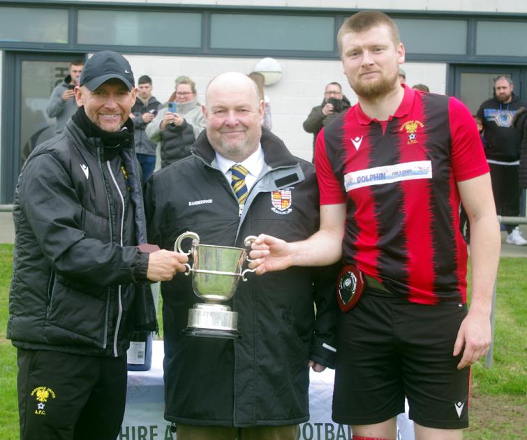 Manager Chris O Sullivan, League Secretary Ian Baker and Goodwick skipper Scott Delaney