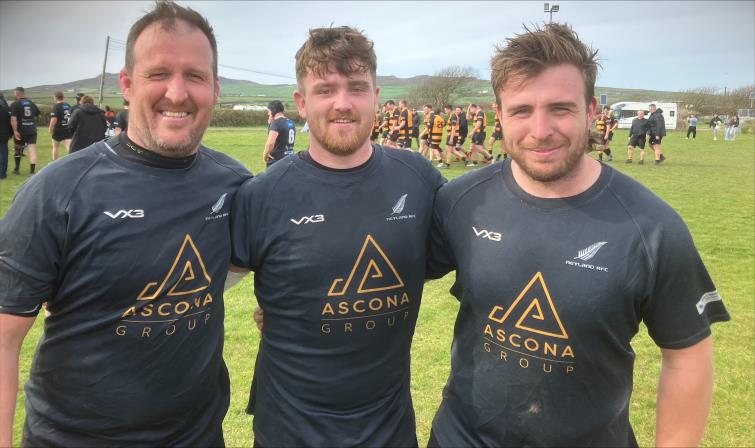 Neyland veteran Mark James with try scorers Ben Williams and Jack Harries