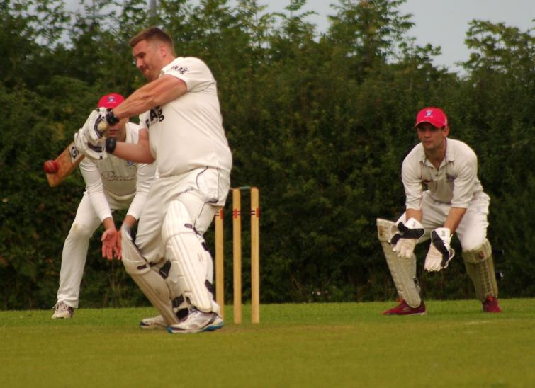 Martin James smashes a boundary through offside covers for Burton