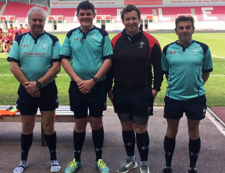 Martyn Rudd (far left) helping to officiate at a top match