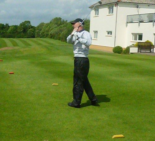 Micky Ellis surveys his shot at the 17th