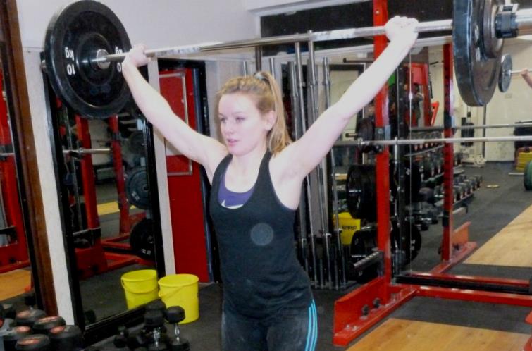 Milly Lacey lifting heavy