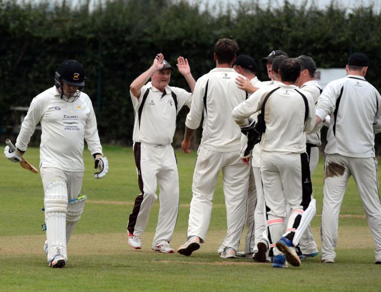 Neyland celebrate a wicket. Pic by Gordon Thomas