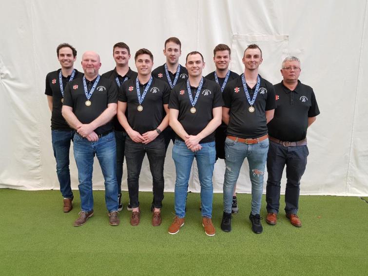 The Neyland team proudly display their medals