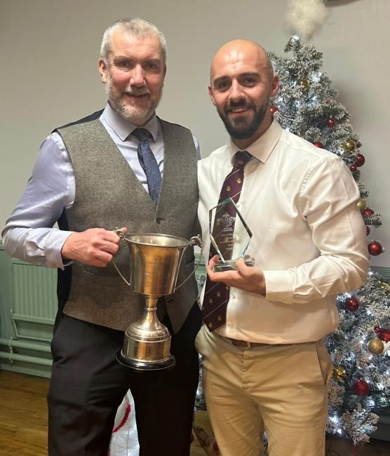 Nick receives his District G award from Aled Williams