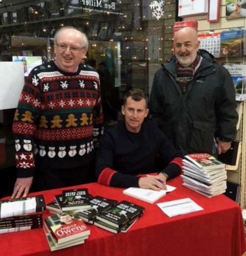 Nigel Owens sandwiched between Marley Davies and Bill Carne